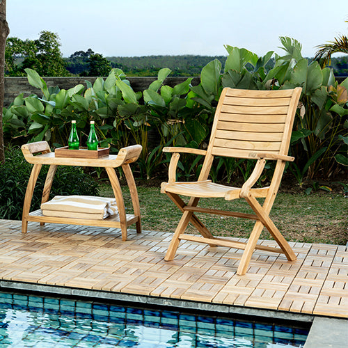 OUTDOOR TEAK FOLDING AND DINING CHAIR PAIRED WITH TEAK SHOWER BENCH AND TEAK WOOD INTERLOCKING FLOOR TILES